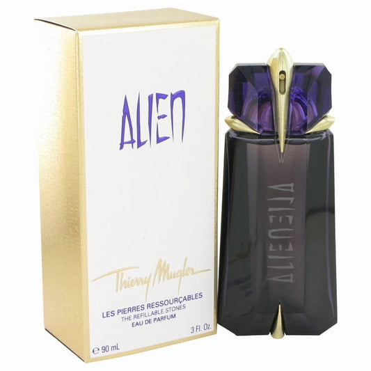 Thierry Mugler Alien perfume bottle and packaging on a white background